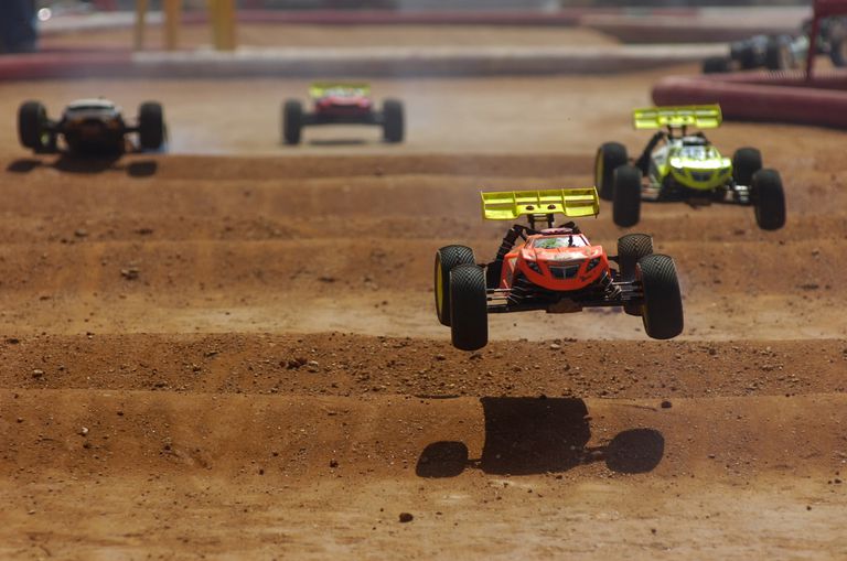 remote controlled cars racing outdoors